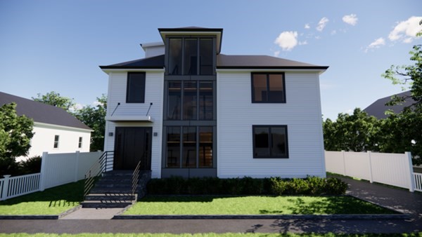 9 Farm Road Belmont, MA 02478 - Photo 2 of 2 a front view of a house with a yard and garage