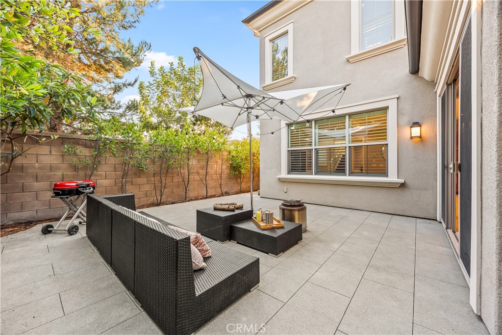 51 Decker Irvine, CA 92620 - Photo 15 of 49 a view of a patio with couches and potted plants
