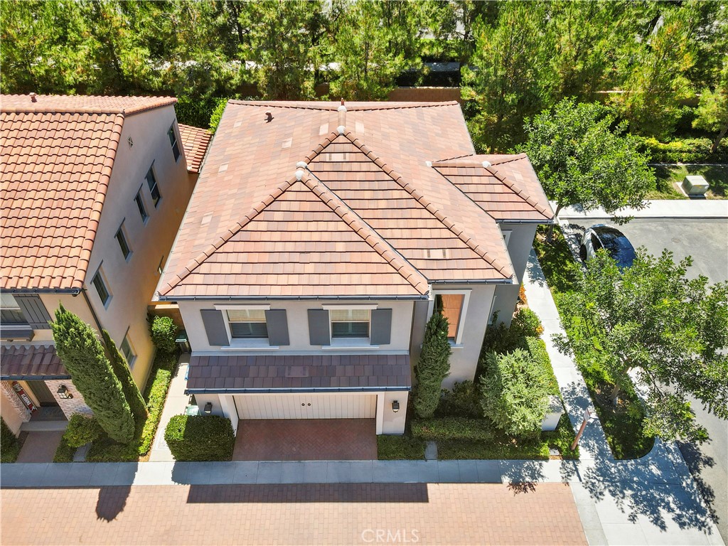 51 Decker Irvine, CA 92620 - Photo 43 of 49 a view of a white house next to a yard