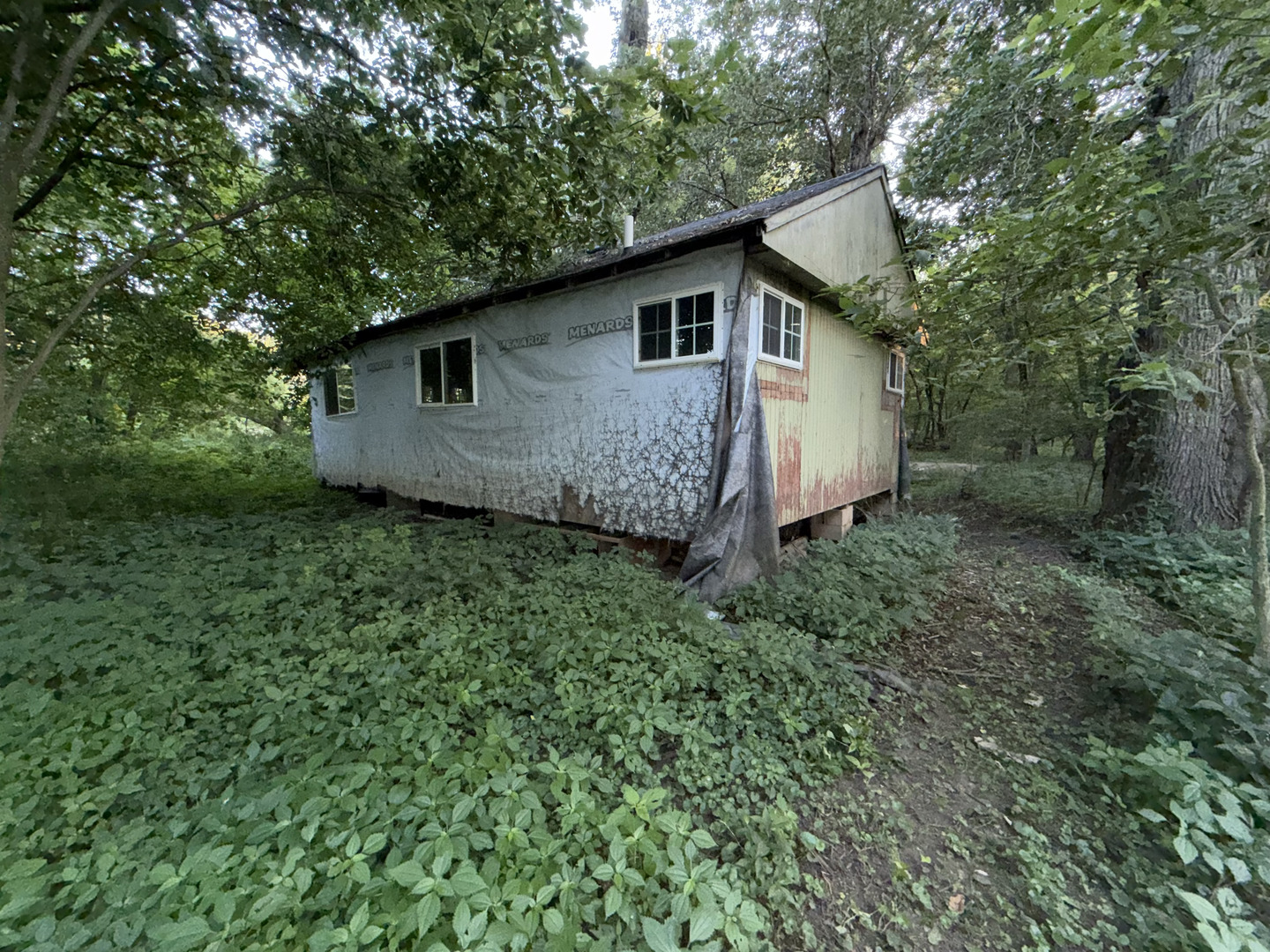 9 Maple Island Momence, IL 60954 - Photo 2 of 10 a aerial view of a house with yard and trees in the background