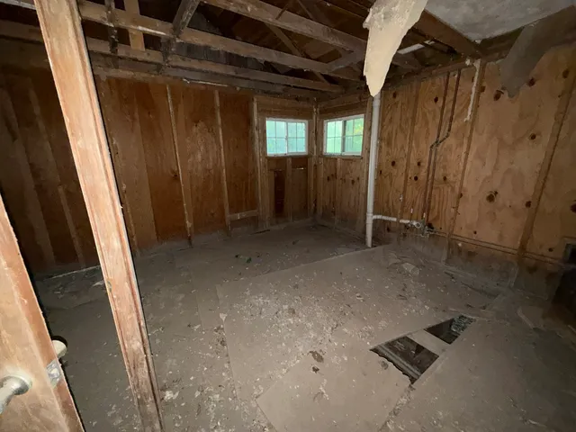 an empty room with windows