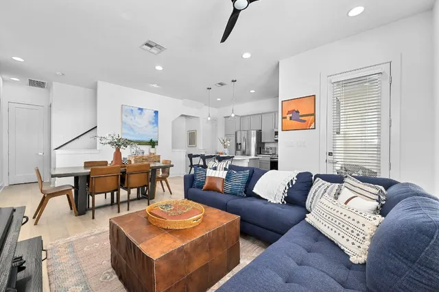 a living room with furniture and a couch