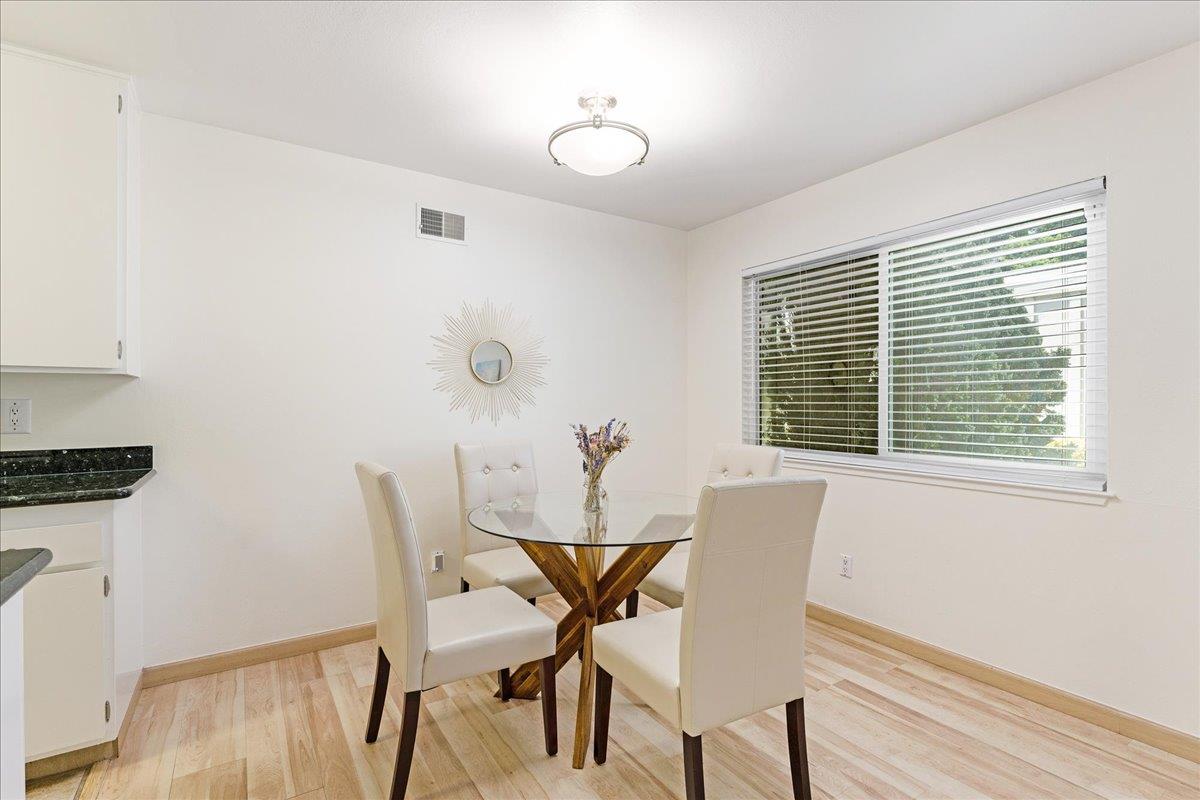 1416 Dolphin Drive Aptos, CA 95003 - Photo 12 of 40 a view of a dining room with furniture and wooden floor