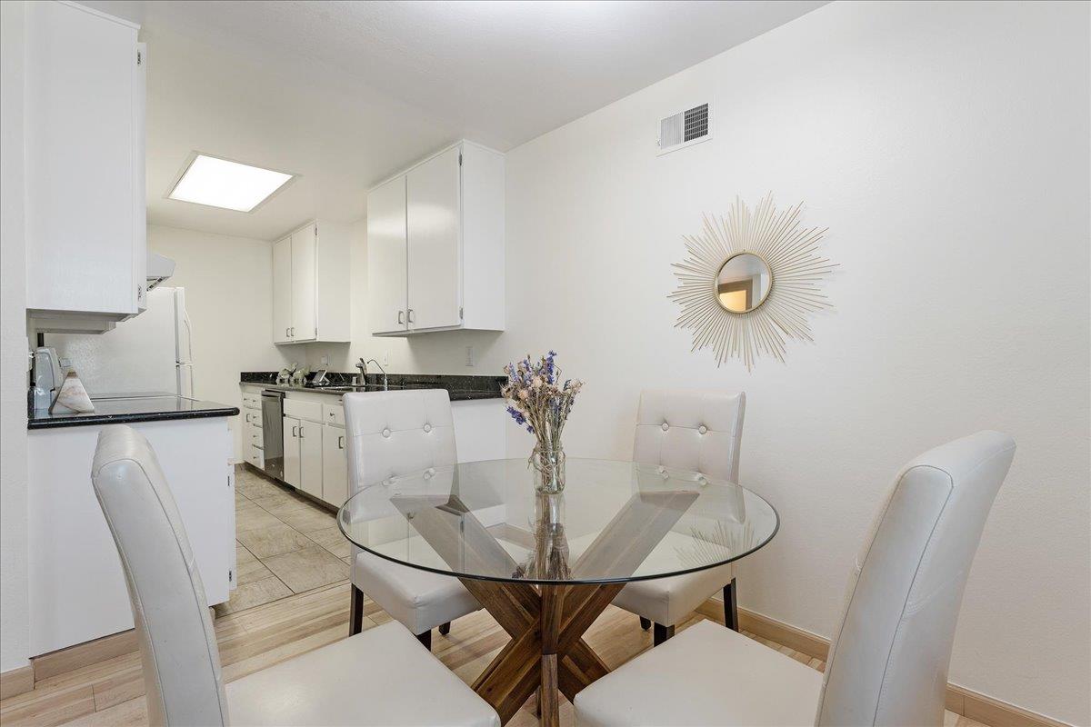 1416 Dolphin Drive Aptos, CA 95003 - Photo 13 of 40 a view of a dining room with furniture and wooden floor