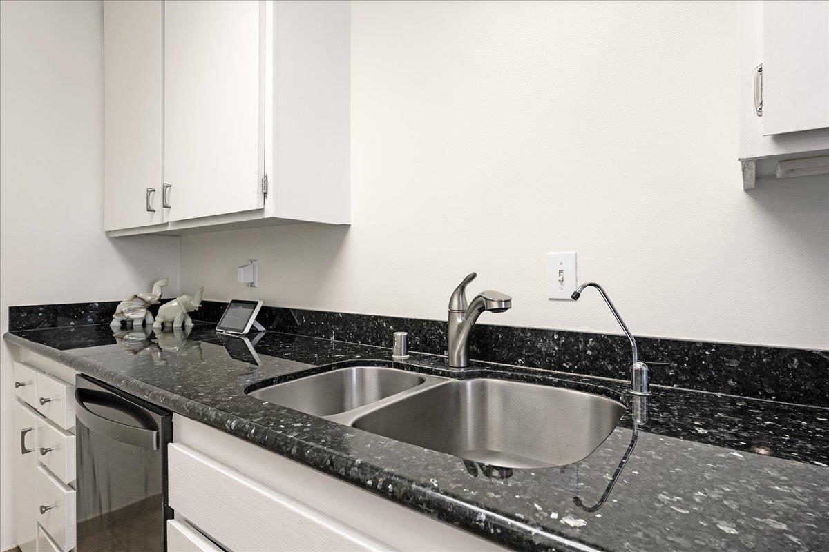 1416 Dolphin Drive Aptos, CA 95003 - Photo 16 of 40 a kitchen with a sink and cabinets