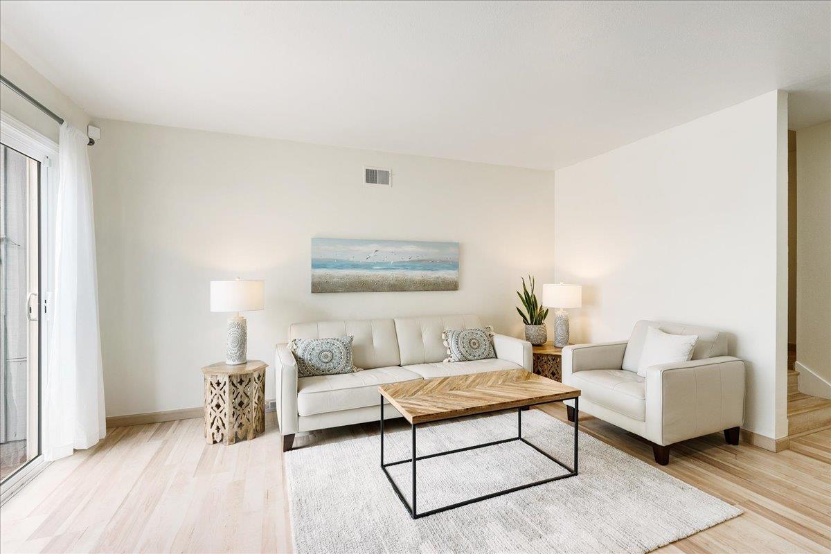 1416 Dolphin Drive Aptos, CA 95003 - Photo 5 of 40 a living room with furniture and a lamp