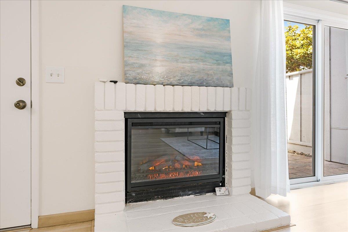 1416 Dolphin Drive Aptos, CA 95003 - Photo 8 of 40 a living room with a fireplace