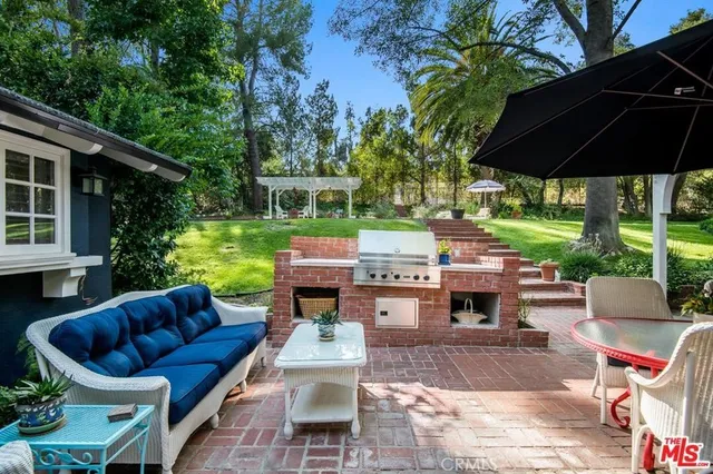 a backyard of a house with seating space
