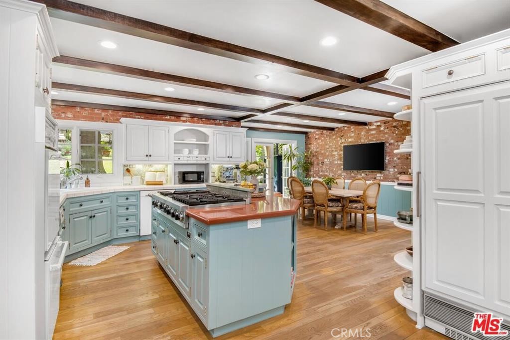 5255 Round Meadow Road Hidden Hills, CA 91302 - Photo 4 of 18 a kitchen with a stove and a refrigerator