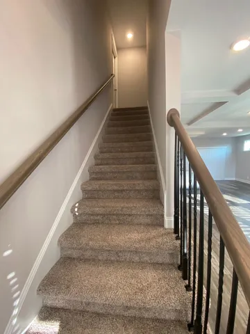 a bathroom with a toilet and a bathtub