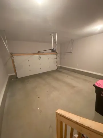 a view of a balcony with wooden floor and fence