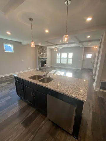 a bathroom with sink and window