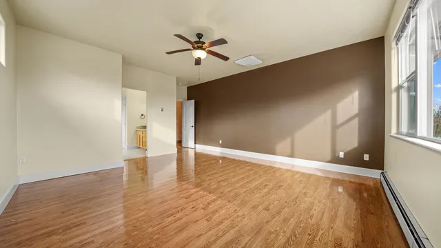 a view of entryway with wooden floor