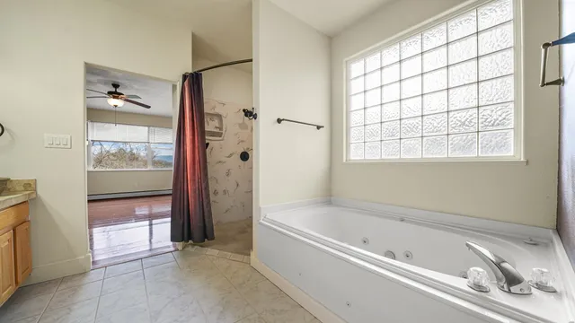 a view of an empty room with a window