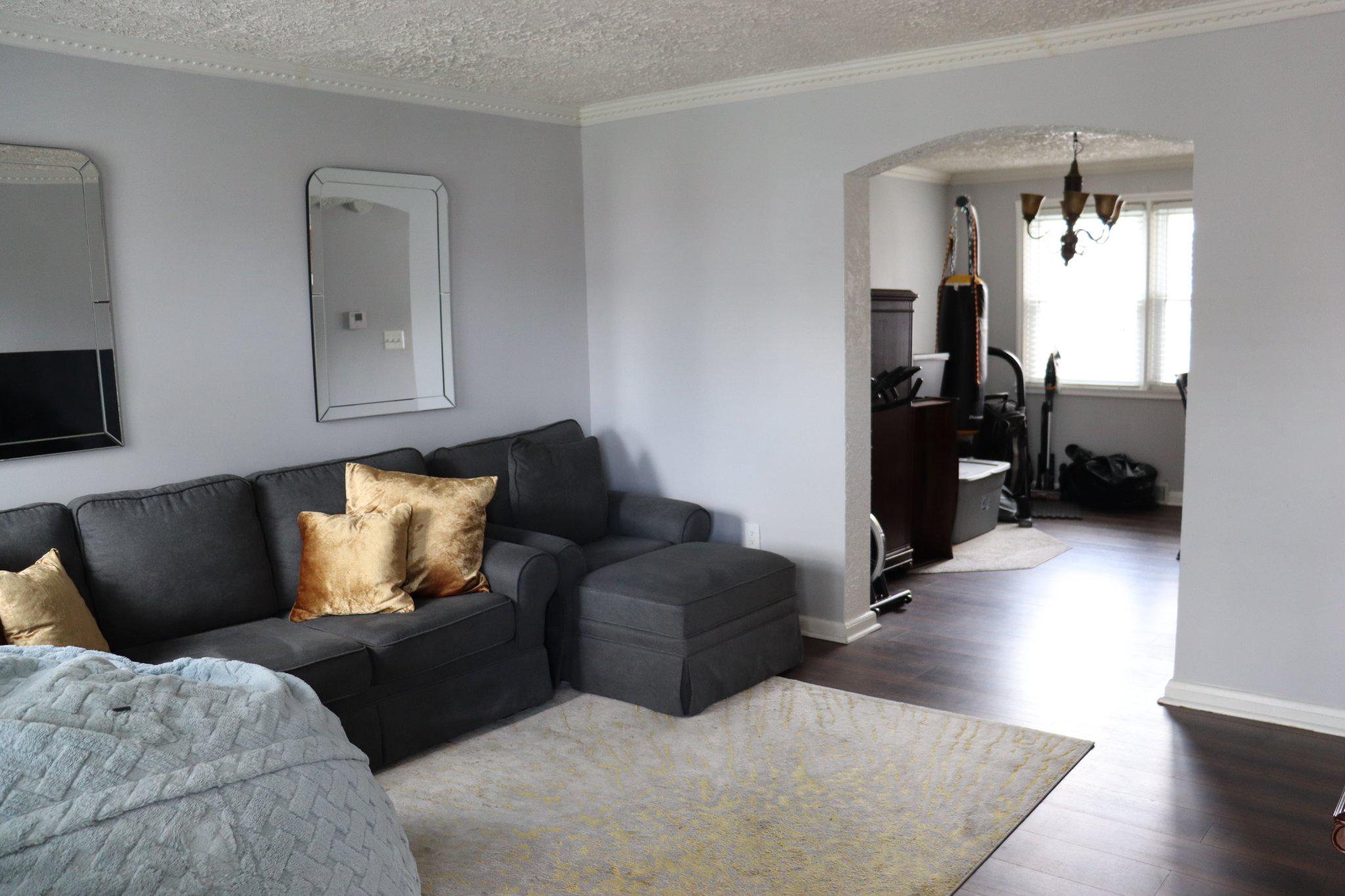 1328 Cedarcroft Road Baltimore, MD 21239 - Photo 2 of 39 Bright open living room with laminate floors.