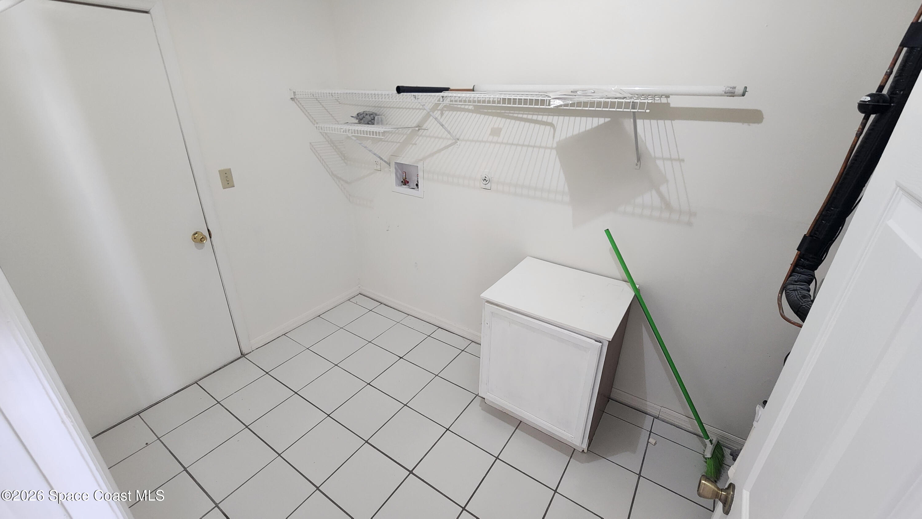 1521 Barber Street Sebastian, FL 32958 - Photo 26 of 33 a view of walk in closet