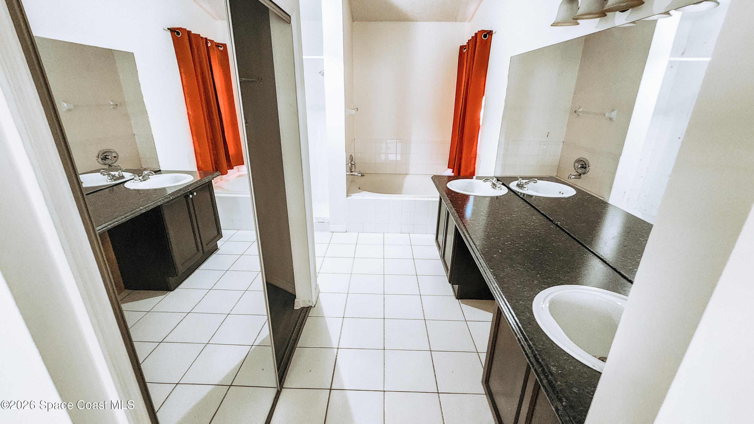 1521 Barber Street Sebastian, FL 32958 - Photo 30 of 33 a bathroom with a bathtub and a sink
