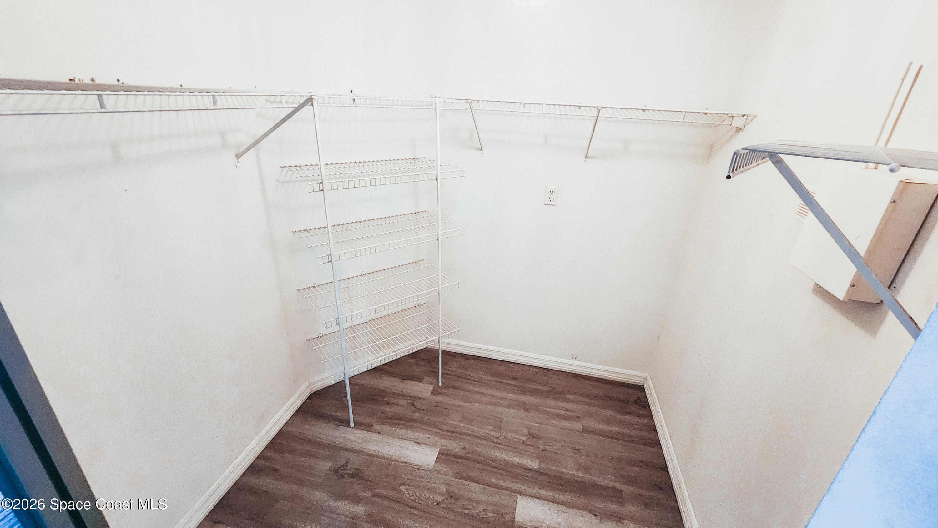 1521 Barber Street Sebastian, FL 32958 - Photo 31 of 33 a view of a room with racks on the wall