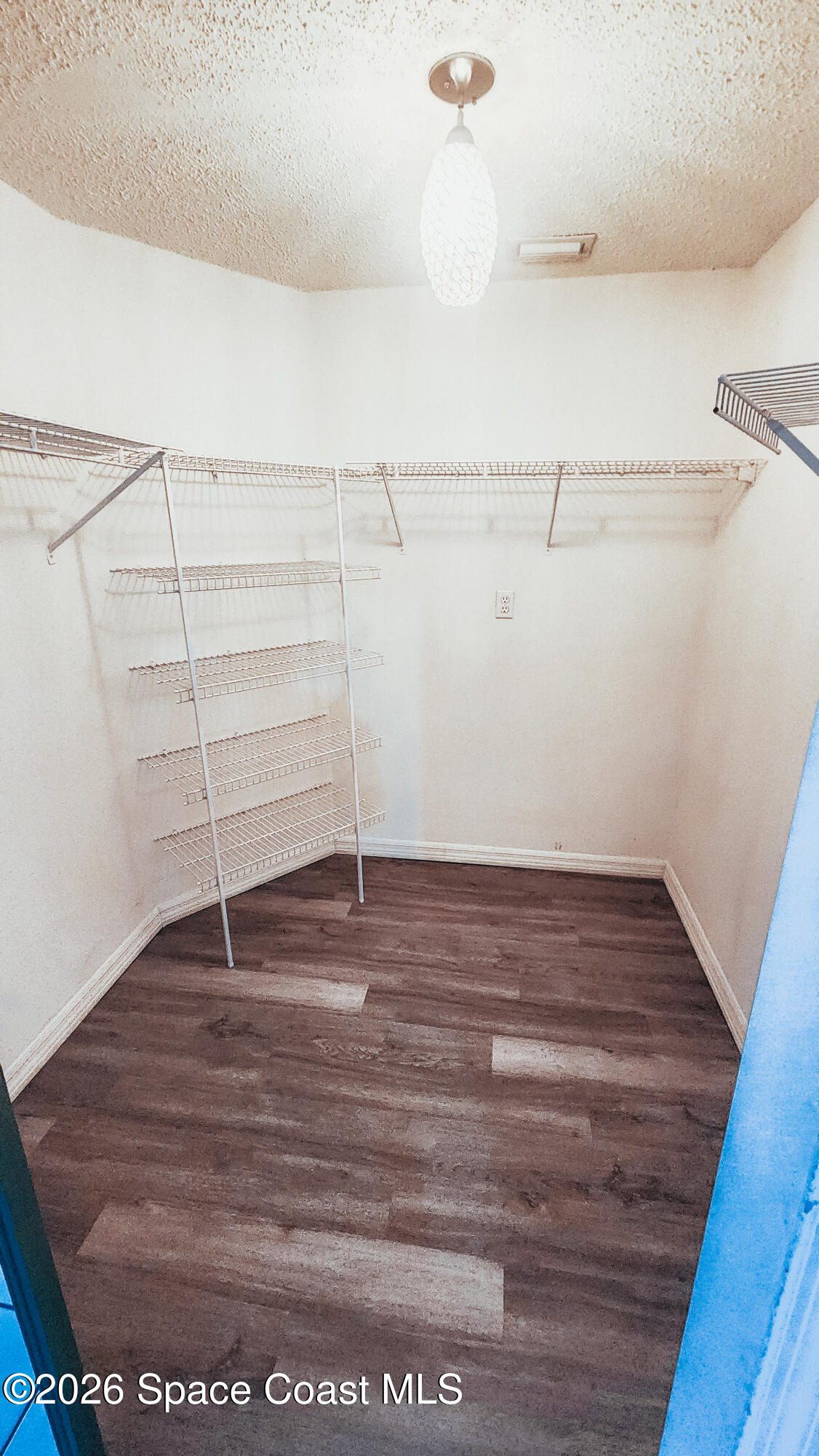1521 Barber Street Sebastian, FL 32958 - Photo 32 of 33 a view of walk in closet with empty racks