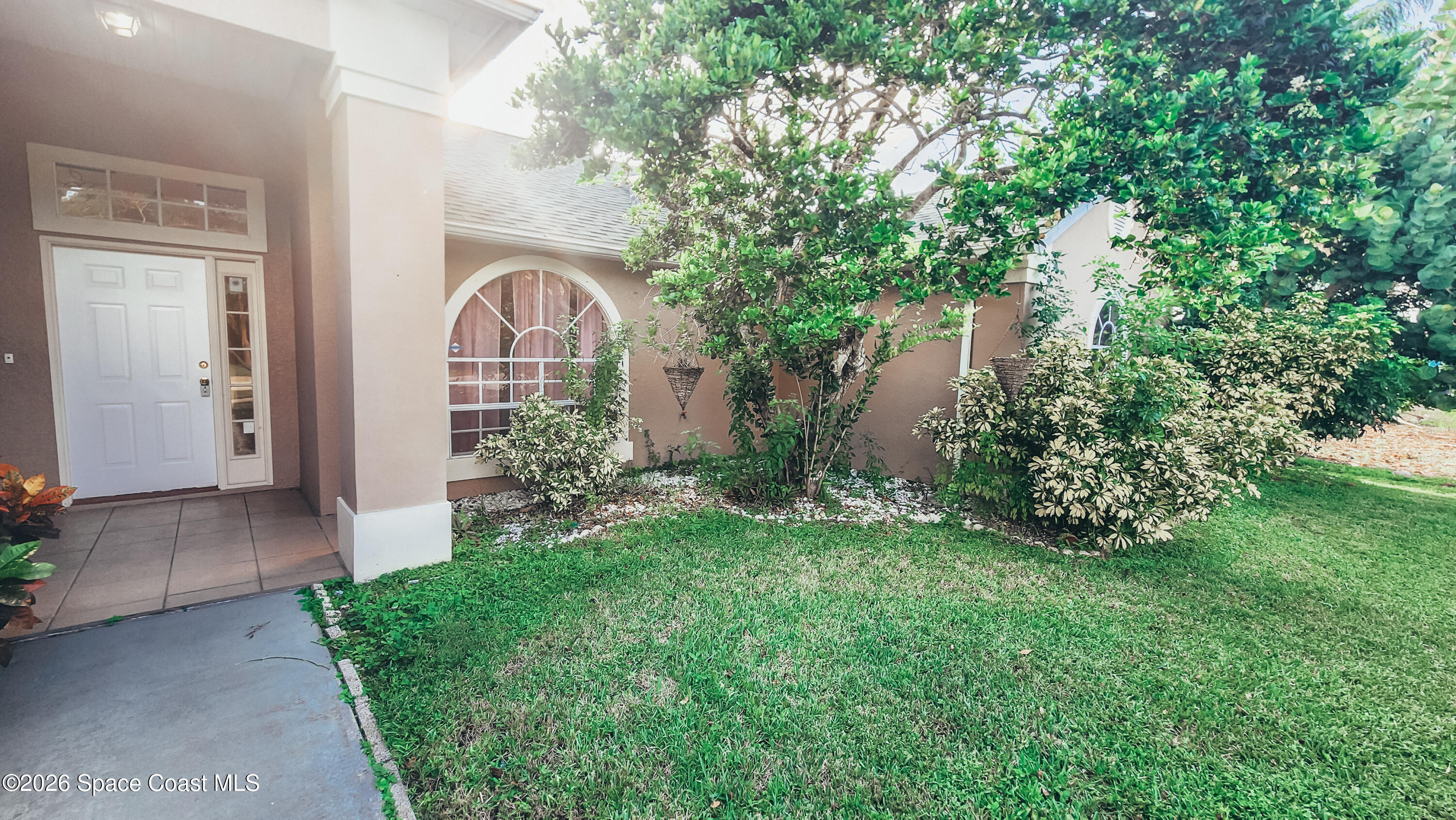 1521 Barber Street Sebastian, FL 32958 - Photo 8 of 33 a front view of a house with garden
