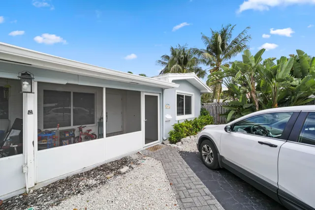 a house view with a backyard space