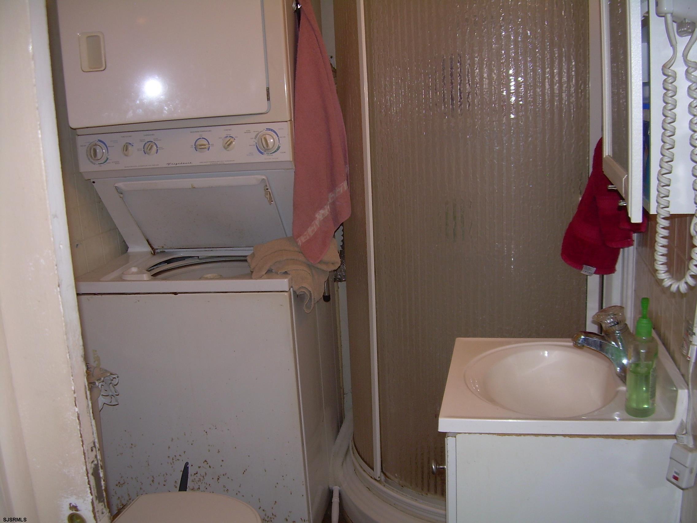 5257 Pleasant Mills Road Hammonton, NJ 08037 - Photo 11 of 27 a room with a washer and dryer