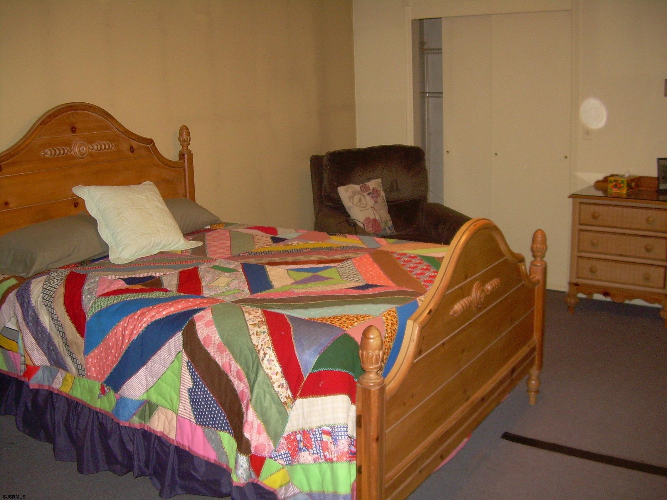 5257 Pleasant Mills Road Hammonton, NJ 08037 - Photo 14 of 27 a bedroom with a bed and dresser