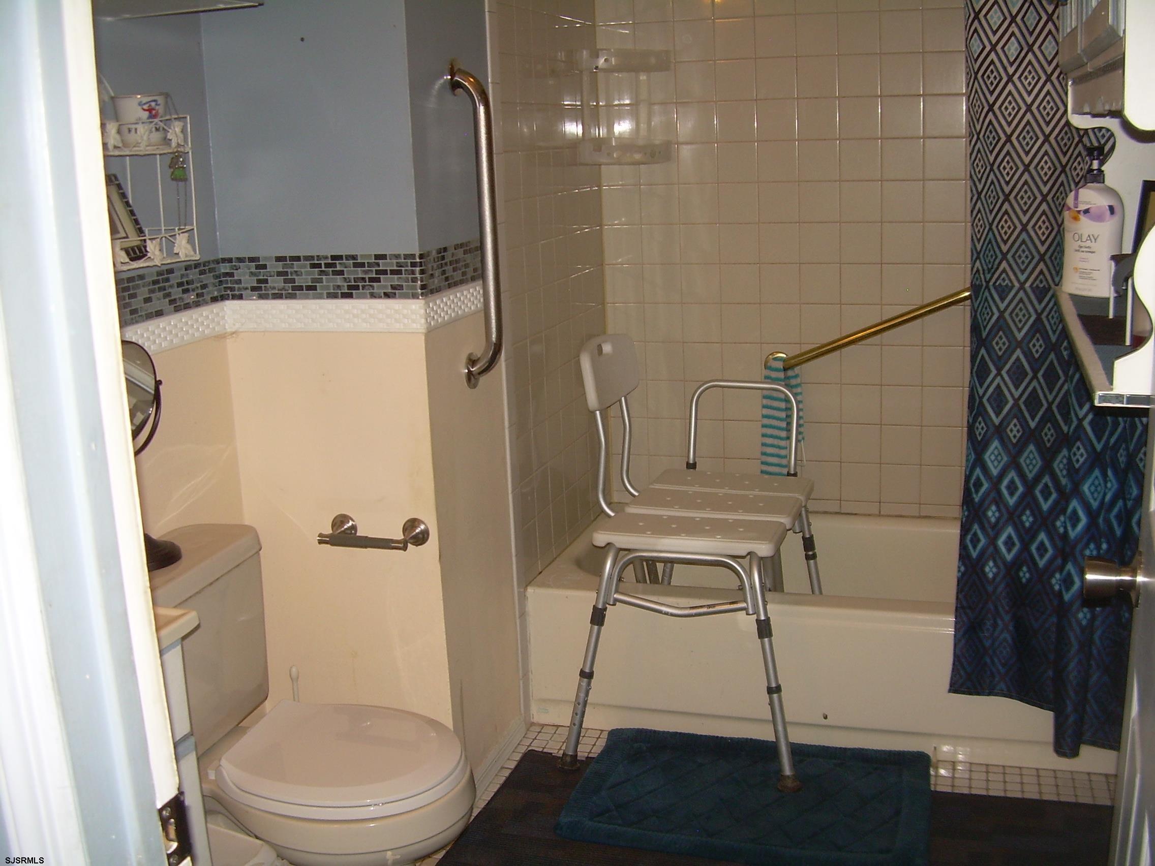 5257 Pleasant Mills Road Hammonton, NJ 08037 - Photo 17 of 27 a bathroom with a toilet and a shower