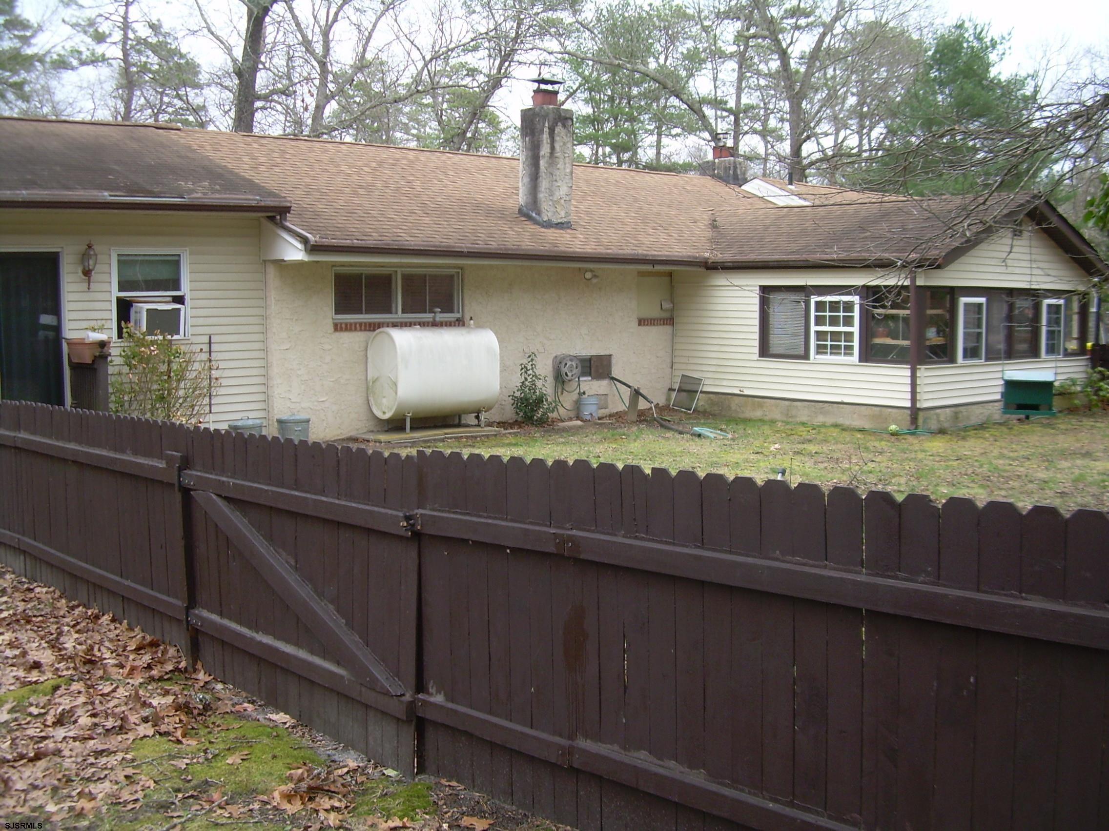 5257 Pleasant Mills Road Hammonton, NJ 08037 - Photo 25 of 27 a front view of a house with garden