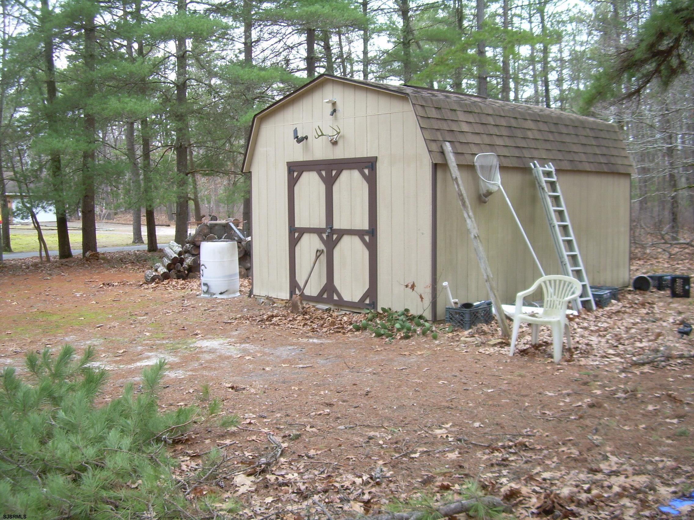5257 Pleasant Mills Road Hammonton, NJ 08037 - Photo 26 of 27 a front view of a house with garden