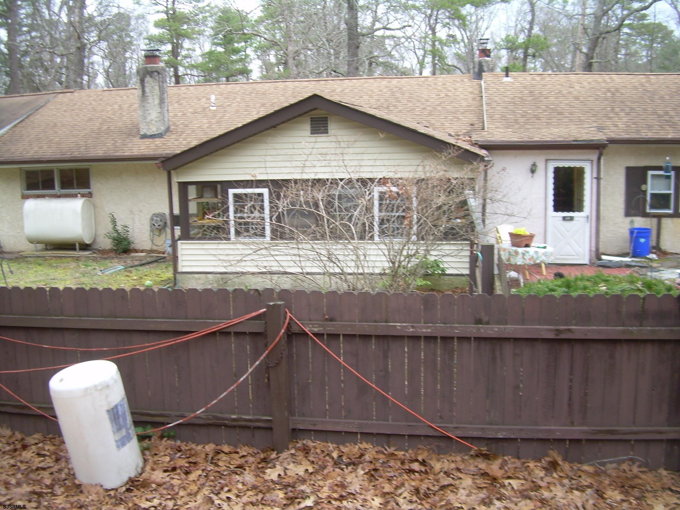 5257 Pleasant Mills Road Hammonton, NJ 08037 - Photo 5 of 27 a front view of a house with garden