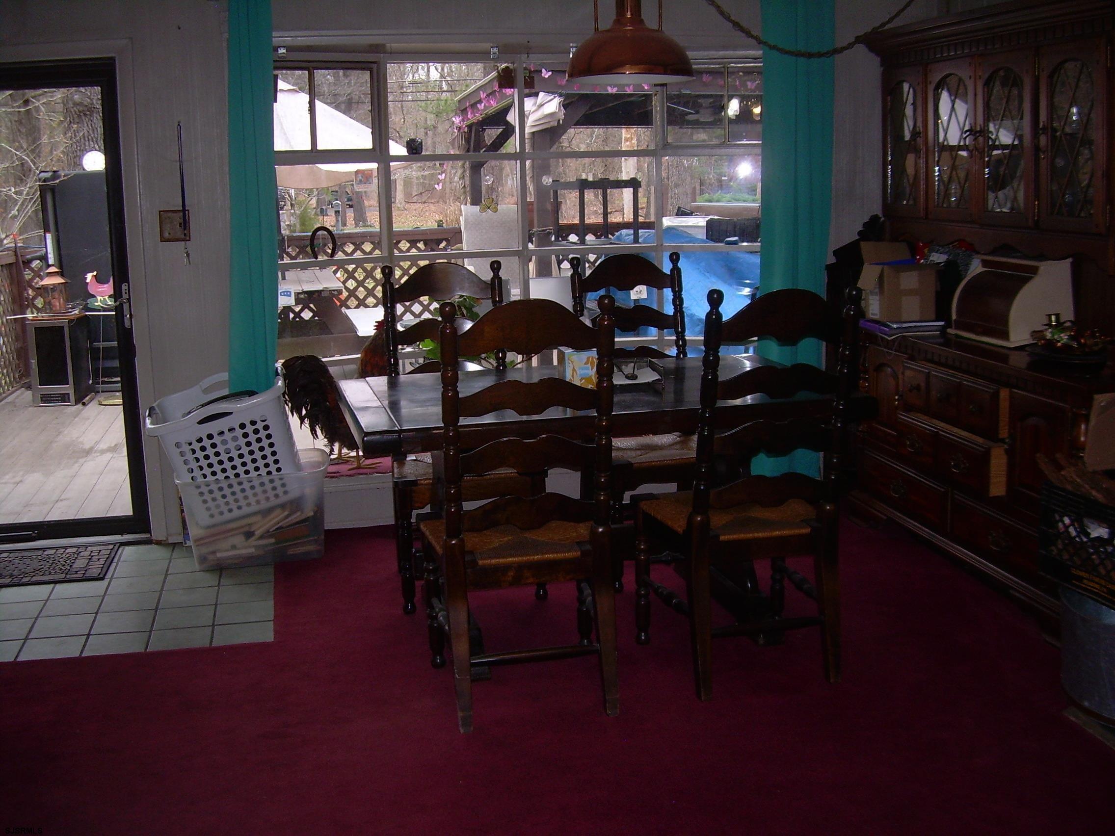 5257 Pleasant Mills Road Hammonton, NJ 08037 - Photo 8 of 27 a view of a dining room with furniture