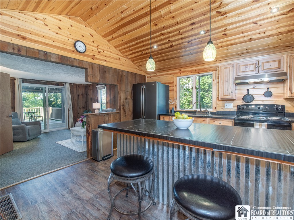 2514 Butts Road North Harmony, NY 14710 - Photo 3 of 38 Enjoy easy dining at the counter in the eat-in kit