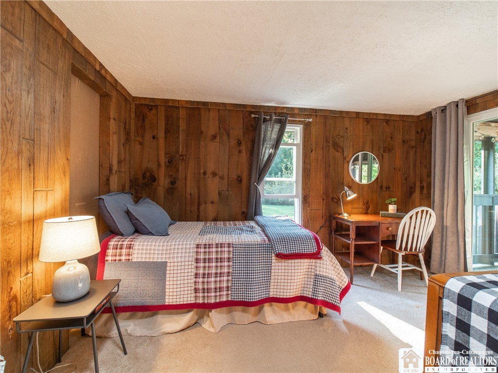 2514 Butts Road North Harmony, NY 14710 - Photo 8 of 38 This bedroom is cozy and bright with access to the