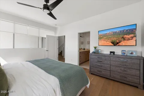 a kitchen with stainless steel appliances a sink and a refrigerator
