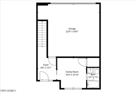 a bedroom with a bed and a desk
