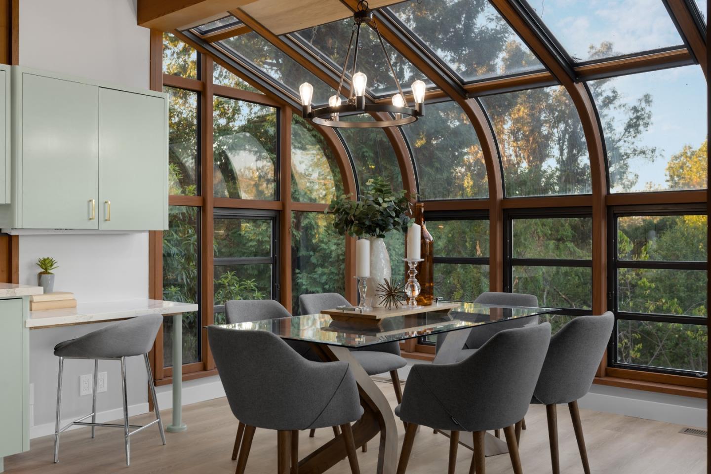 21221 Canyon View Drive Saratoga, CA 95070 - Photo 11 of 45 a dining room with furniture a chandelier and a rug