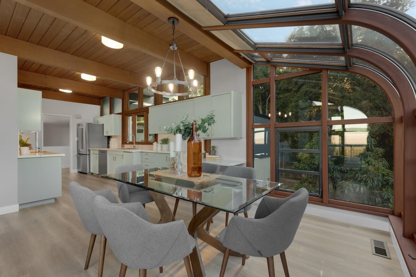 21221 Canyon View Drive Saratoga, CA 95070 - Photo 12 of 45 a dining room with furniture and a floor to ceiling window