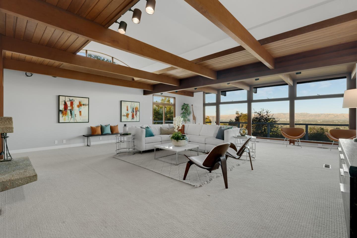 21221 Canyon View Drive Saratoga, CA 95070 - Photo 15 of 45 a living room with furniture and a large window