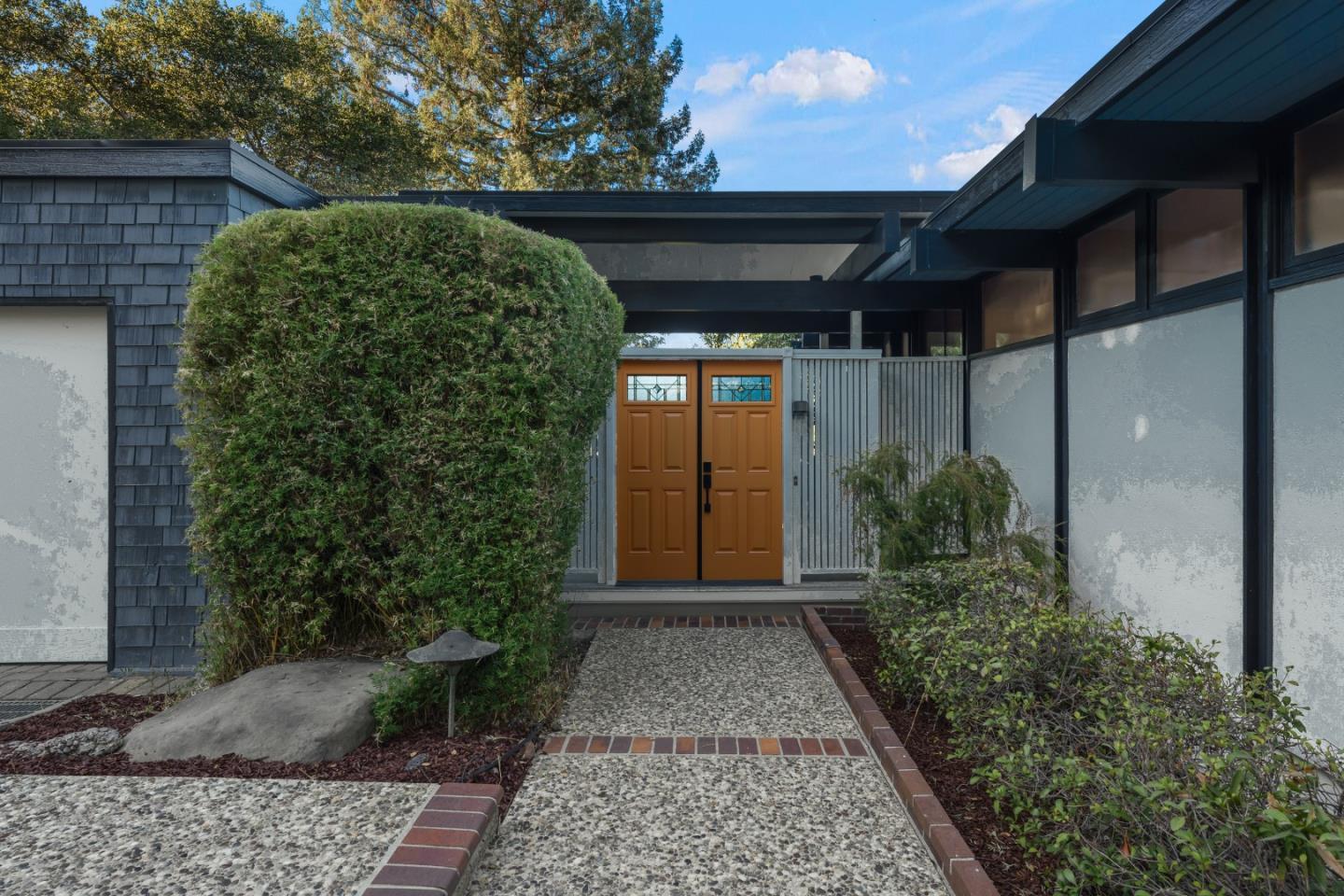 21221 Canyon View Drive Saratoga, CA 95070 - Photo 2 of 45 a couple of potted plants in front of door