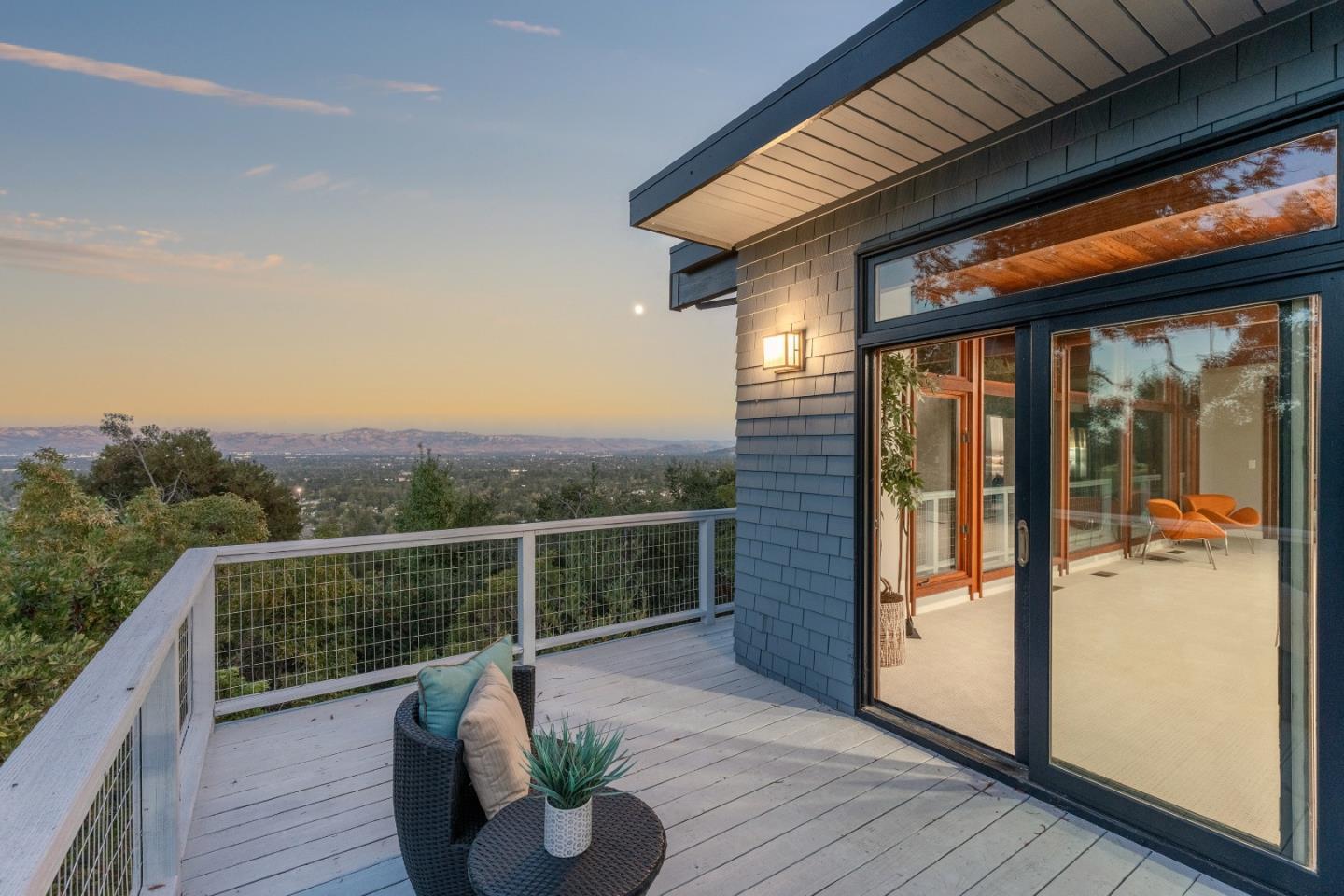 21221 Canyon View Drive Saratoga, CA 95070 - Photo 22 of 45 a view of roof deck with couches and wooden floor