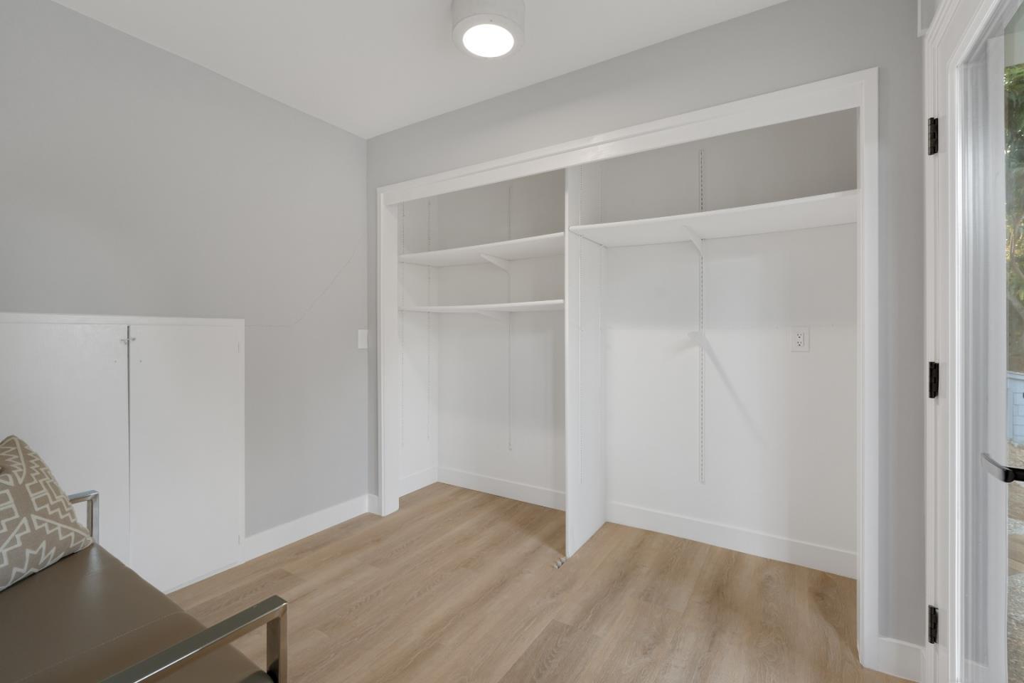 21221 Canyon View Drive Saratoga, CA 95070 - Photo 35 of 45 a view of an empty room with wooden floor