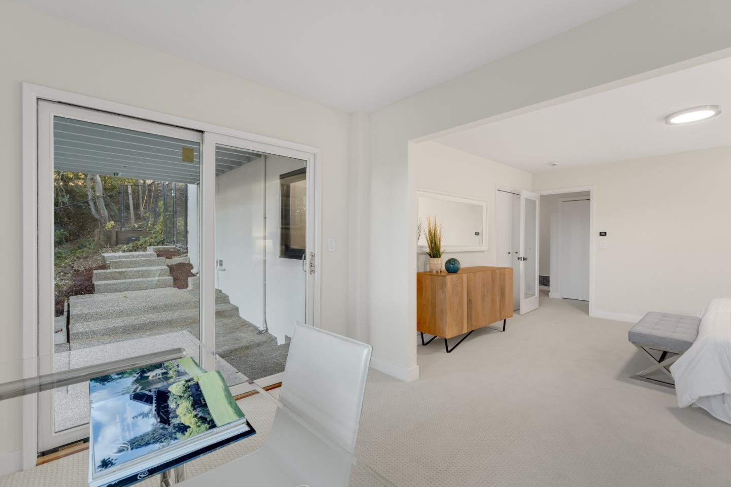 21221 Canyon View Drive Saratoga, CA 95070 - Photo 37 of 45 view of living room with furniture and a window