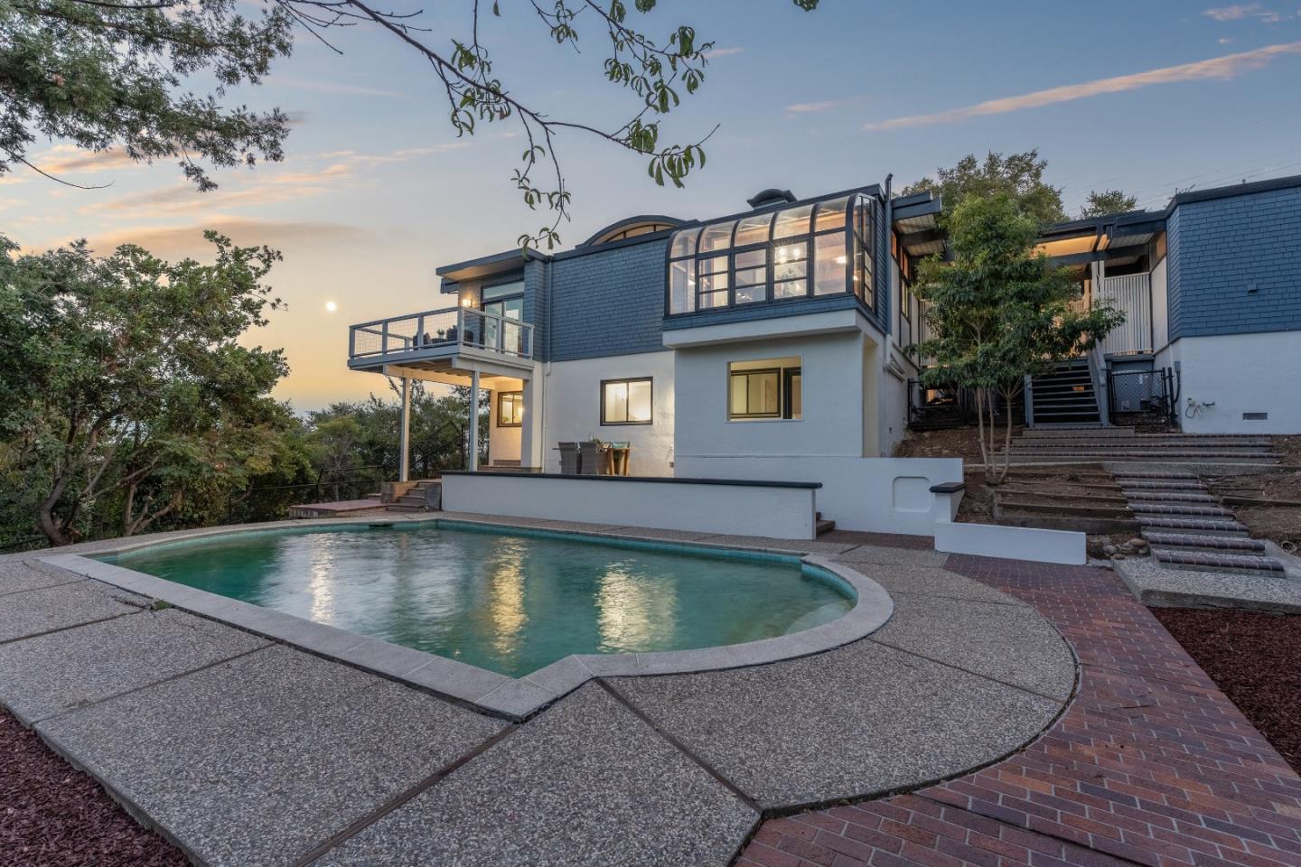 21221 Canyon View Drive Saratoga, CA 95070 - Photo 40 of 45 a view of a house with a swimming pool