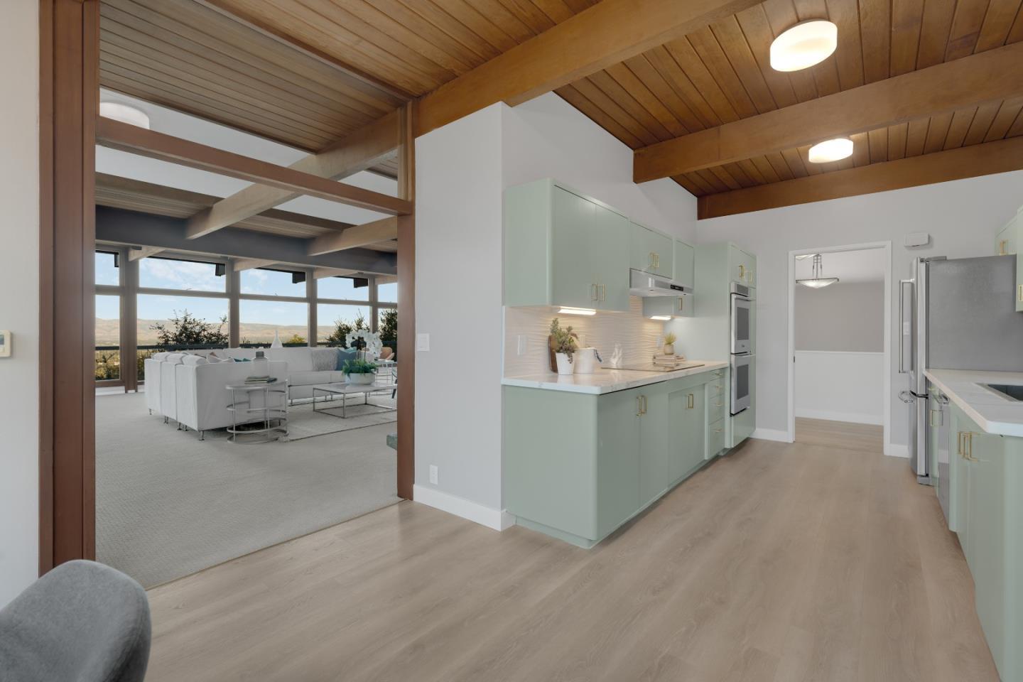 21221 Canyon View Drive Saratoga, CA 95070 - Photo 9 of 45 a bathroom with a sink and mirror