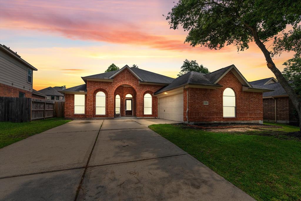 Welcome home! Extra wide and extended driveway with 2 car garage, spacious front yard with plenty of shade.