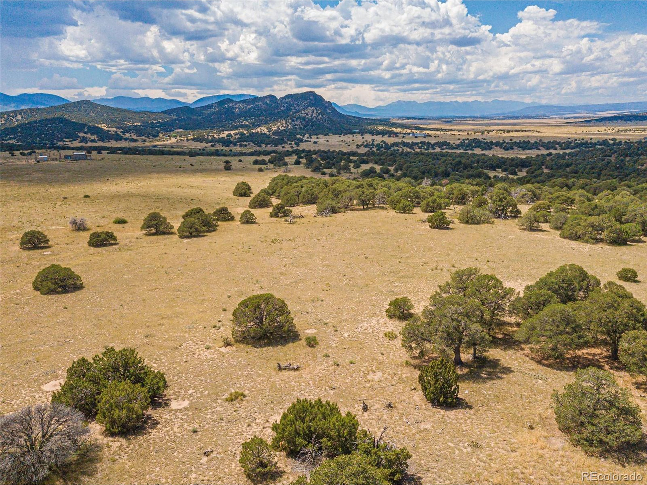 521 County Road Walsenburg, CO 81089 - Photo 2 of 29 a view of a lake with a mountain