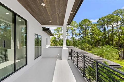 a view of a yard with table and chairs