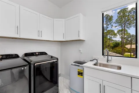 a view of a palm trees in front of a house