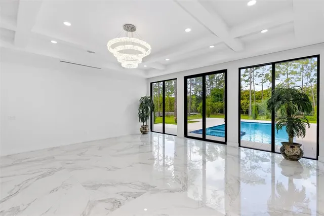 a white stove top oven sitting inside of a kitchen